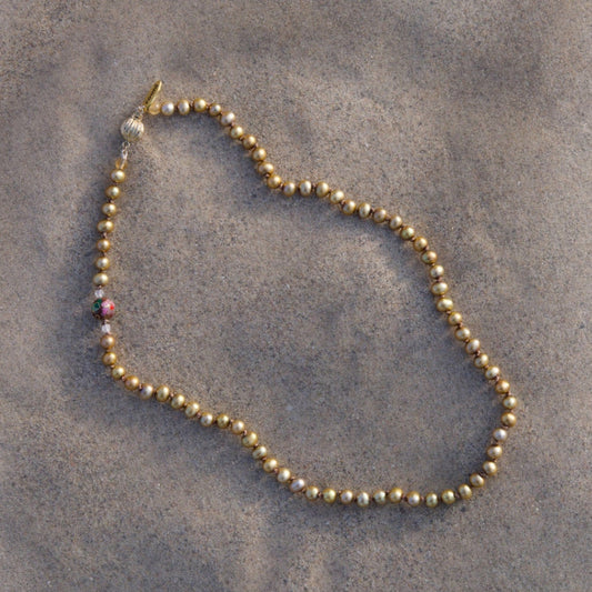 small gold pearl