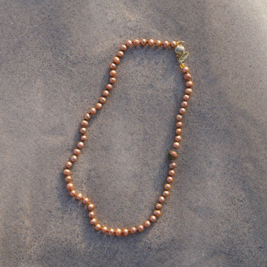 small bronze pearl